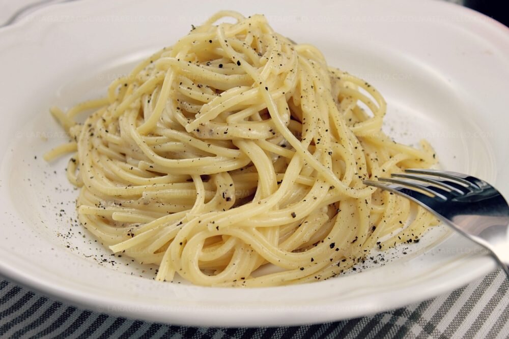 Pasta cacio e pepe (cheese and black pepper) a la romana La ragazza