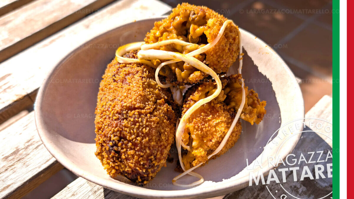 Supplì - risotto croquettes with meat sofrito and a mozzarella heart